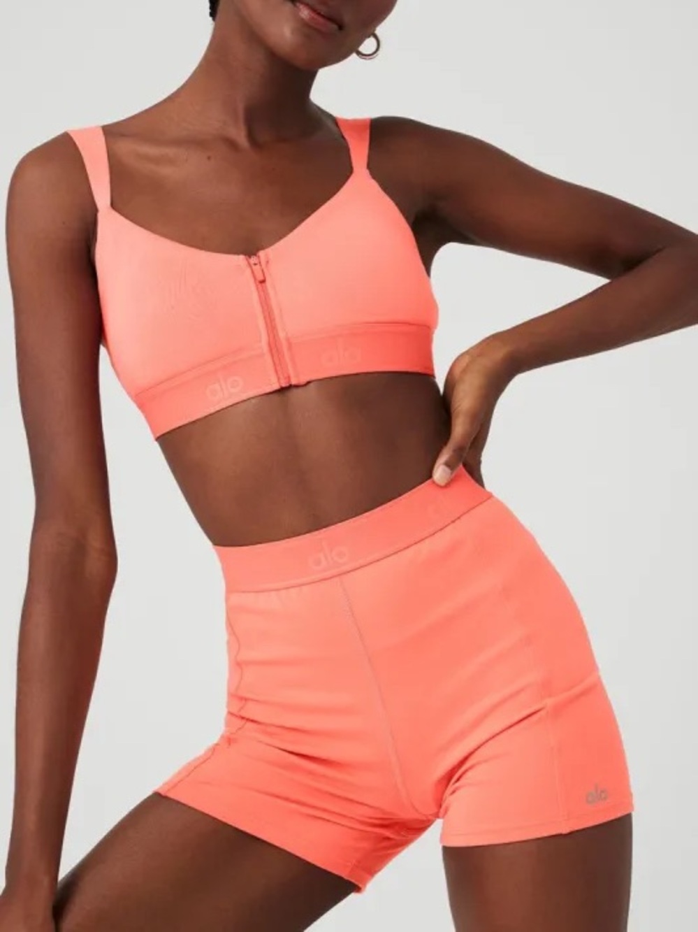 NWT ALO Yoga Alosoft Showcase Shorts 4" size XS in Candy Orange